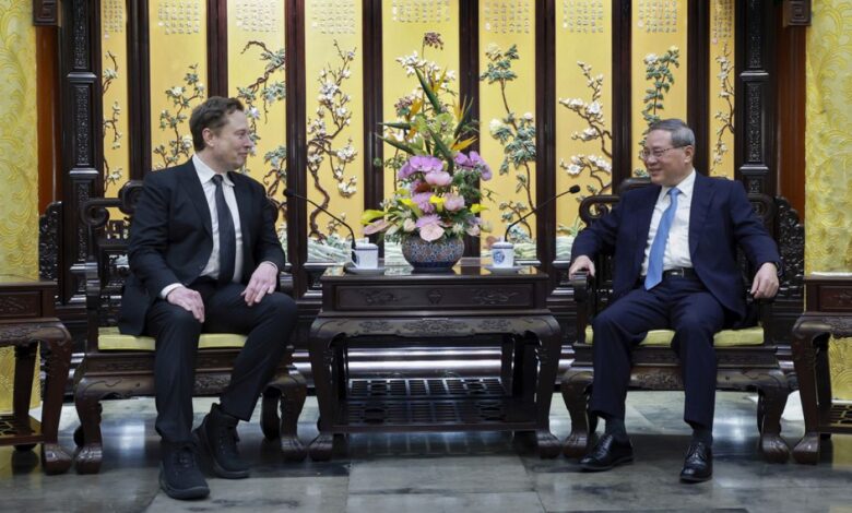 Tesla’s Musk in China as rivals reveal new electric cars at Beijing auto show Tesla’s Musk in China as rivals reveal new electric cars at Beijing auto show