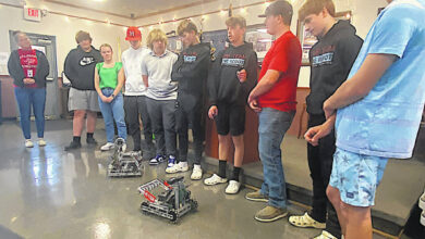 HMS Robotics team visits Rotary