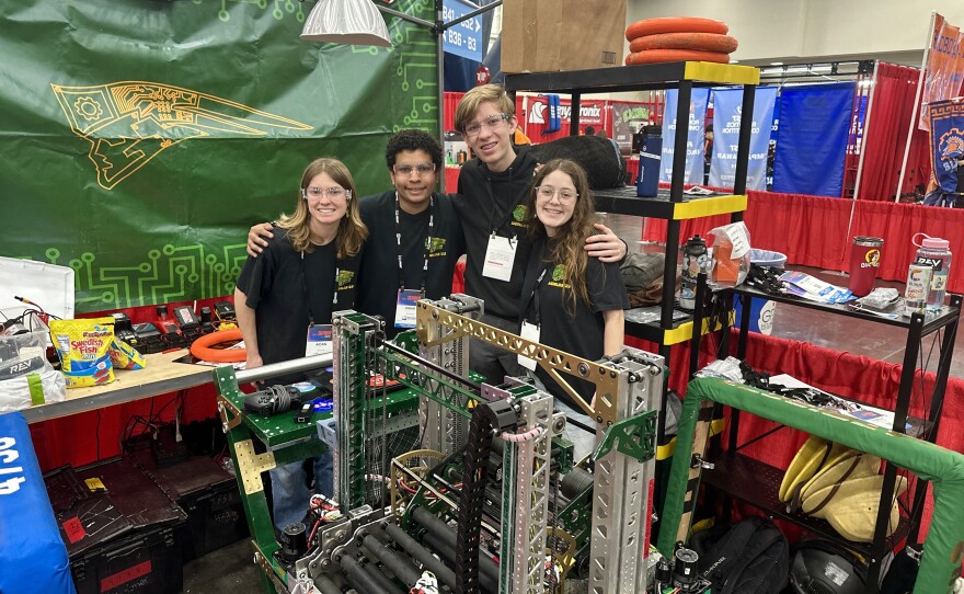 Some of the team members from the Patrick Henry High School robotics team are seen in the pit where they prepare for this week's competition in Houston, Texas, April 17, 2024.