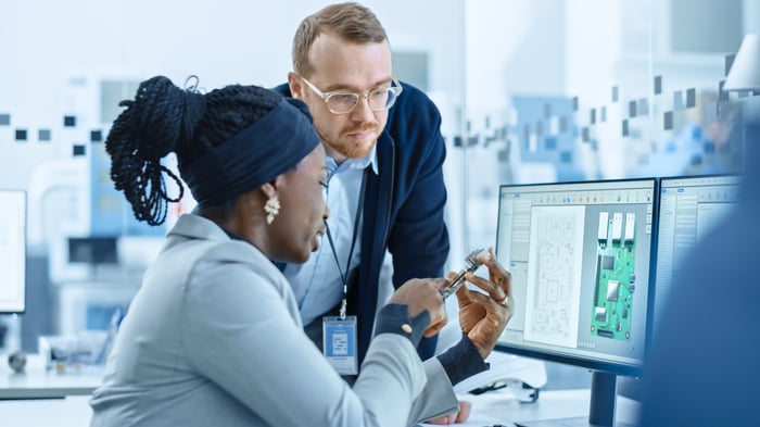 Engineers designing a semiconductor chip