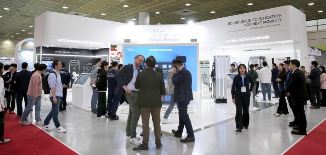 Visitors look aground Hyundai KEFICOs booth at EVS37 at COEX in Seoul on April 24 2024 AJU PRESS Han Jun-gu