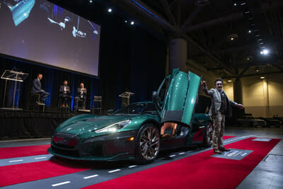 The Rimac Nevera hypercar is driven on stage during a press event at the Canadian International AutoShow on February 15, 2024. (CNW Group/Grand Touring Automobiles)