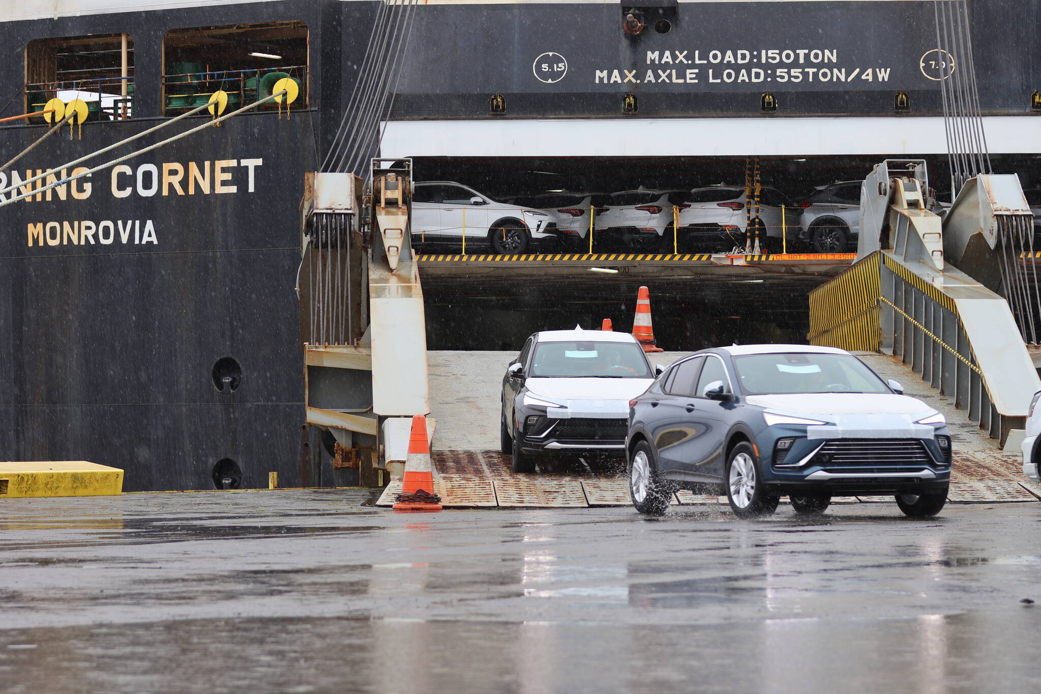 Michael S. Lockett / The Daily World
Cars drive off the Morning Coronet, a car carrier offloading its cargo at the Port of Grays Harbor.