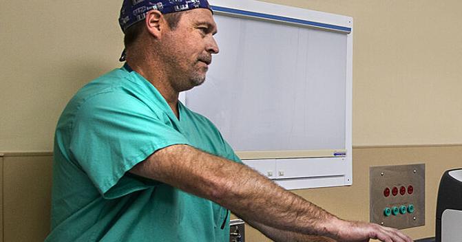 Local robotic surgeon hits major milestone of 1,500 cases Local robotic surgeon hits major milestone of 1,500 cases