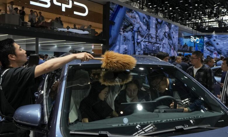 Tesla founder Musk visits China as competitors show off new electric vehicles at Beijing auto show |
