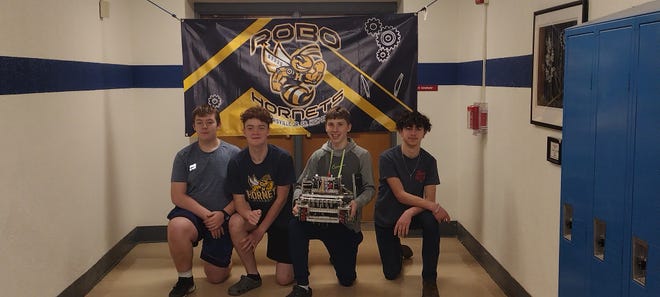 From left: Harpursville RoboHornets team members Alex Afify, Jacob Rueffer, Liem Donahue, Glen Miller