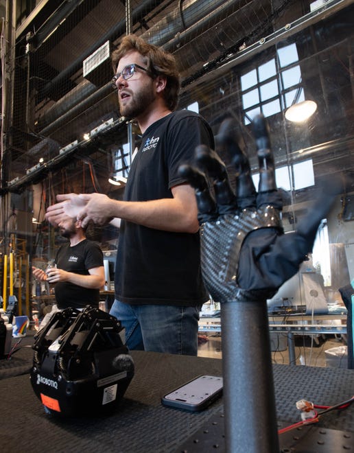 Software engineer Nick Kitchel talks about robotics during the IHMC open house in Pensacola on Thursday, April 11, 2024.