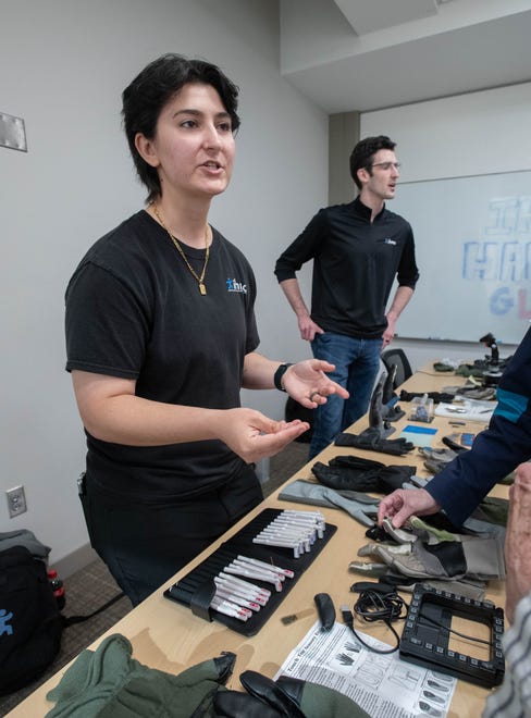 Research associate Savannah Ripley gives a demonstration during the IHMC open house in Pensacola on Thursday, April 11, 2024.