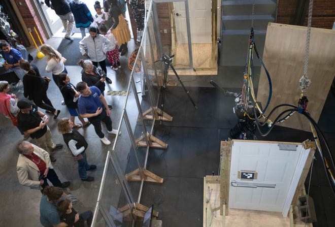 People tour the Robotics Lab during the IHMC open house in Pensacola on Thursday, April 11, 2024.