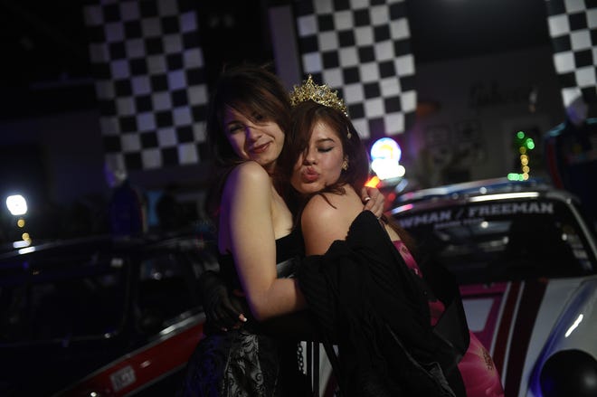 Sparks High students celebrate during their prom at the National Automobile Museum in Reno on April 27, 2024.