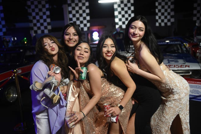 Sparks High students celebrate their prom at the National Automobile Museum