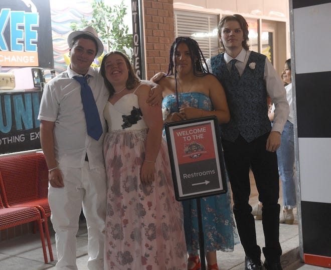 Sparks High students celebrate during their prom at the National Automobile Museum in Reno on April 27, 2024.