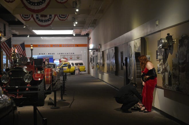 Sparks High students celebrate during their prom at the National Automobile Museum in Reno on April 27, 2024.