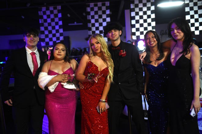 Sparks High students celebrate during their prom at the National Automobile Museum in Reno on April 27, 2024.