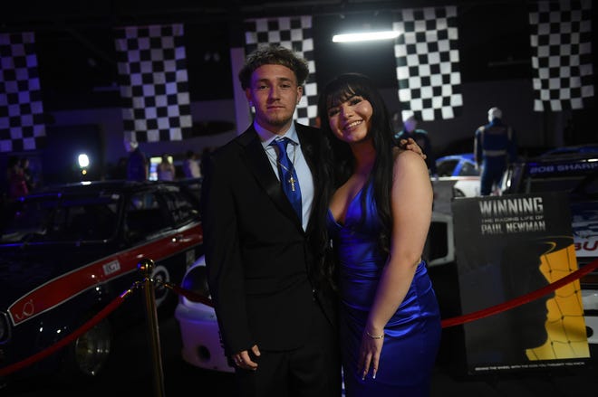 Sparks High students celebrate during their prom at the National Automobile Museum in Reno on April 27, 2024.