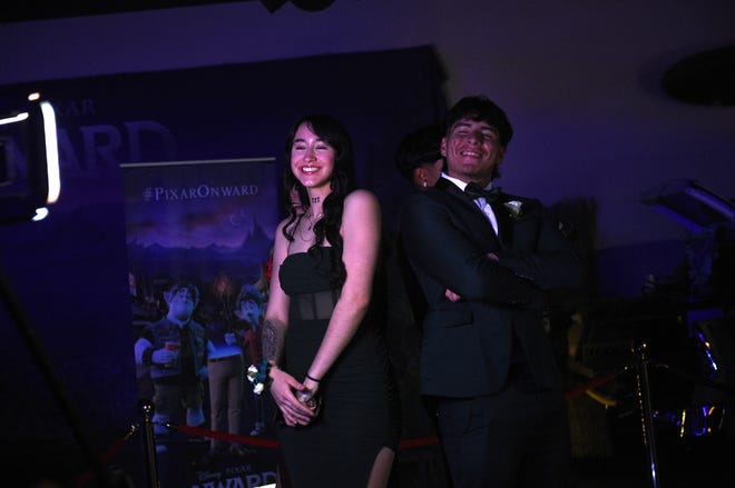 Sparks High students celebrate during their prom at the National Automobile Museum in Reno on April 27, 2024.