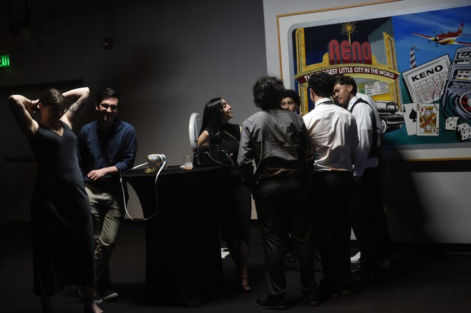 Sparks High students celebrate during their prom at the National Automobile Museum in Reno on April 27, 2024.