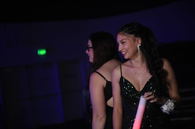 Sparks High students celebrate during their prom at the National Automobile Museum in Reno on April 27, 2024.