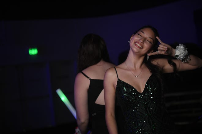 Sparks High students celebrate during their prom at the National Automobile Museum in Reno on April 27, 2024.