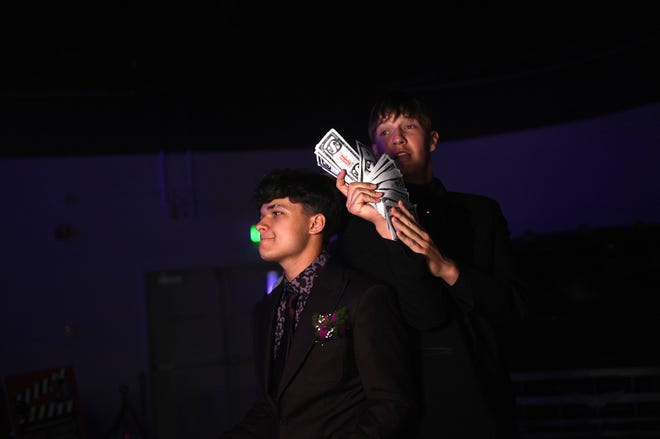 Sparks High students celebrate during their prom at the National Automobile Museum in Reno on April 27, 2024.