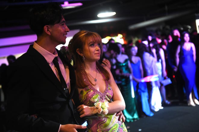 Sparks High students celebrate during their prom at the National Automobile Museum in Reno on April 27, 2024.