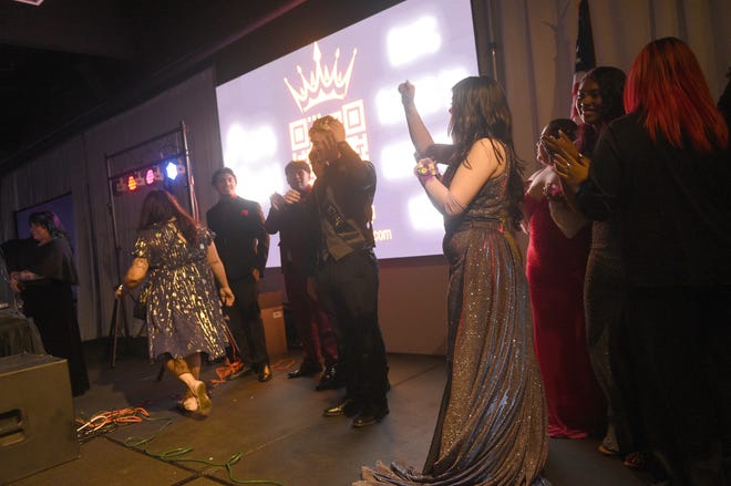 Sparks High students celebrate during their prom at the National Automobile Museum in Reno on April 27, 2024.