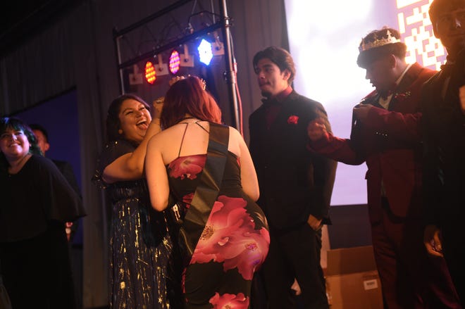 Sparks High students celebrate during their prom at the National Automobile Museum in Reno on April 27, 2024.