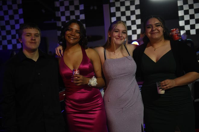 Sparks High students celebrate during their prom at the National Automobile Museum in Reno on April 27, 2024.