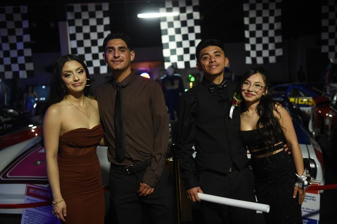 Sparks High students celebrate during their prom at the National Automobile Museum in Reno on April 27, 2024.