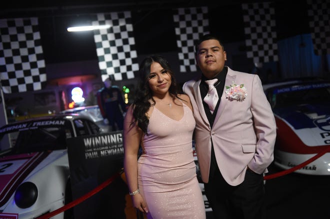 Sparks High students celebrate during their prom at the National Automobile Museum in Reno on April 27, 2024.