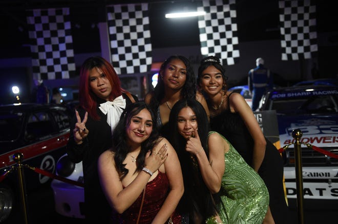 Sparks High students celebrate during their prom at the National Automobile Museum in Reno on April 27, 2024.