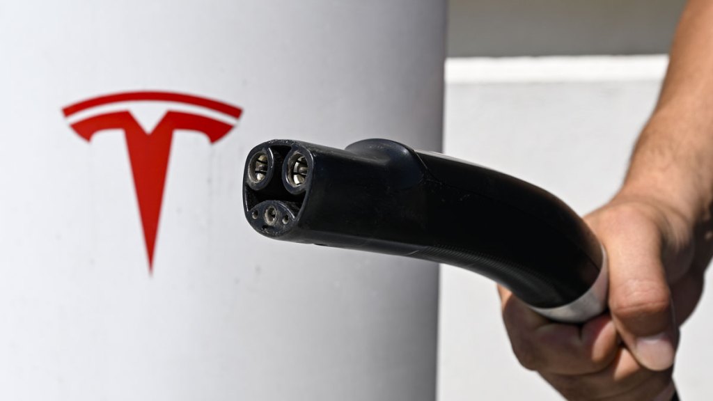 A Tesla EV charging plug.