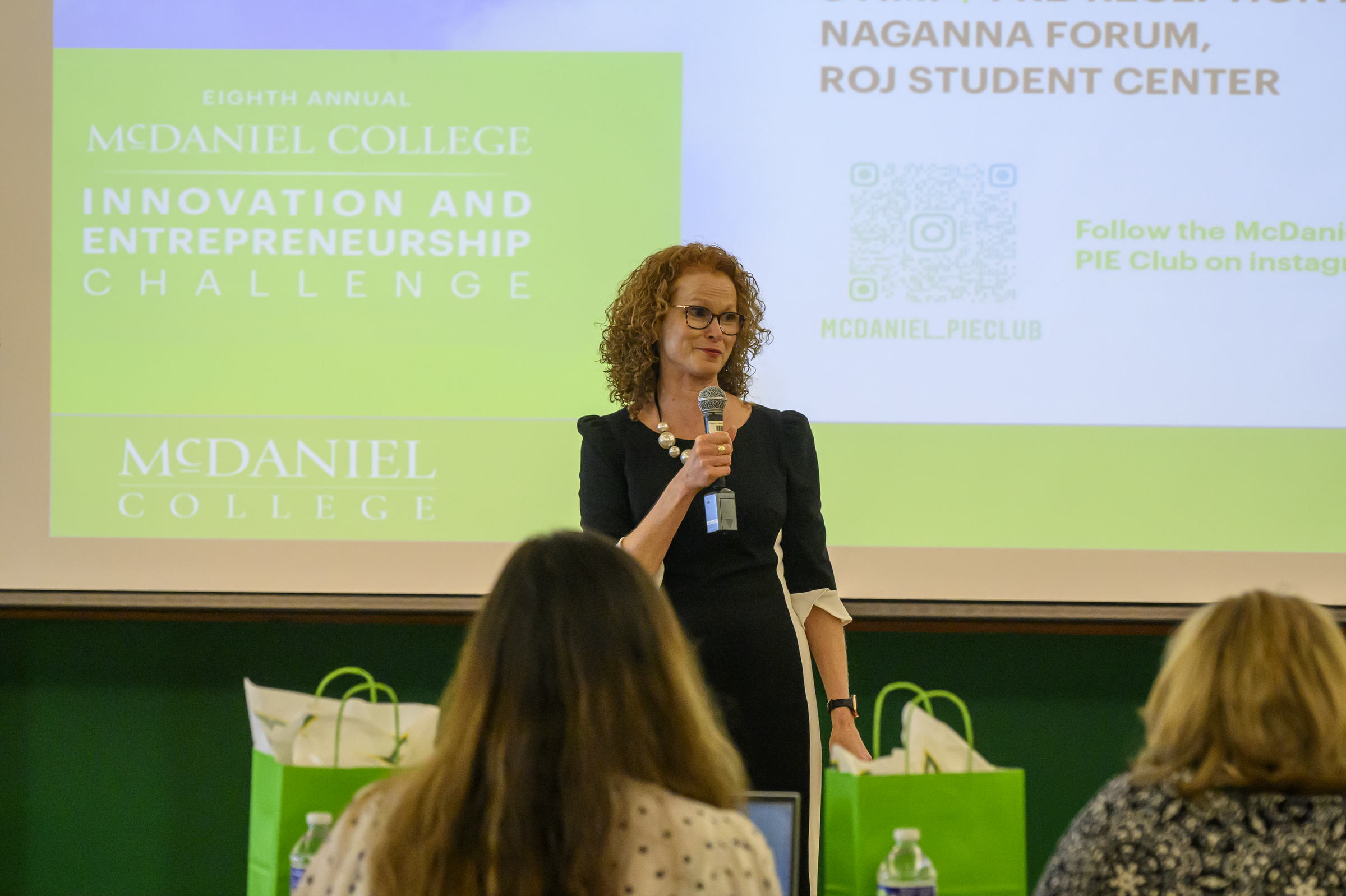 Adjunct lecturer Kathleen Pratt welcomes people to the Innovation and Entrepreneurship Challenge at McDaniel College. (Thomas Walker/Freelance)