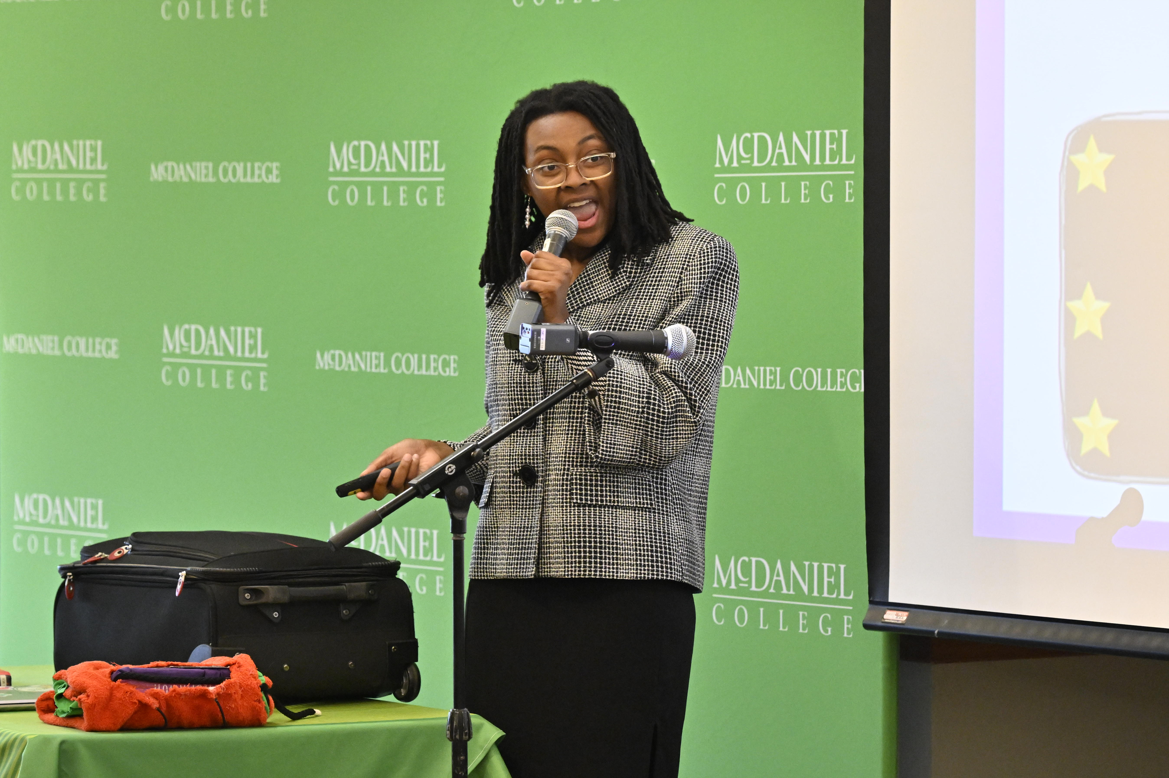 Moonasia Williams presents her idea, Mecca Astro adaptable bag, during the Innovation and Entrepreneurship Challenge at McDaniel College. (Thomas Walker/Freelance)