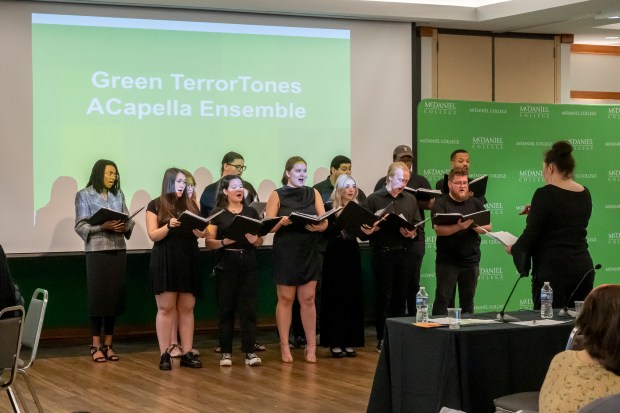 The Green TerrorTones under the direction of Kyler Engler, performs during a break at the Innovation and Entrepreneurship Challenge at McDaniel College. (Thomas Walker/Freelance)