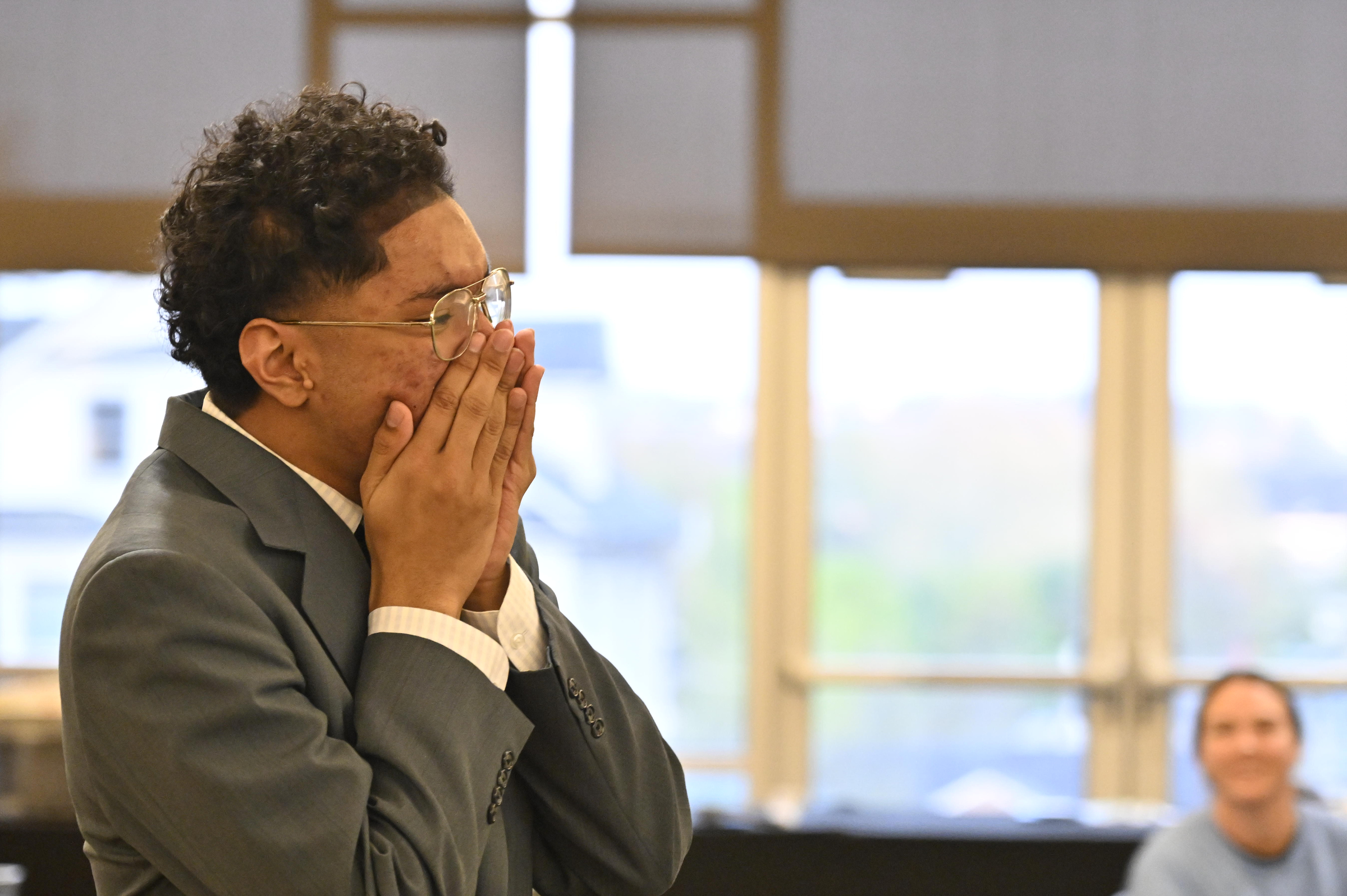 Josiah Yung reacts after winning the Innovation and Entrepreneurship Challenge at McDaniel College. (Thomas Walker/Freelance)