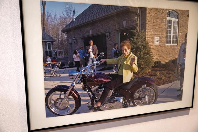 photograph of Marie  Bonaminio, mother of James O. Bonaminio of Jungle Jim’s International Market, on a motorcycle