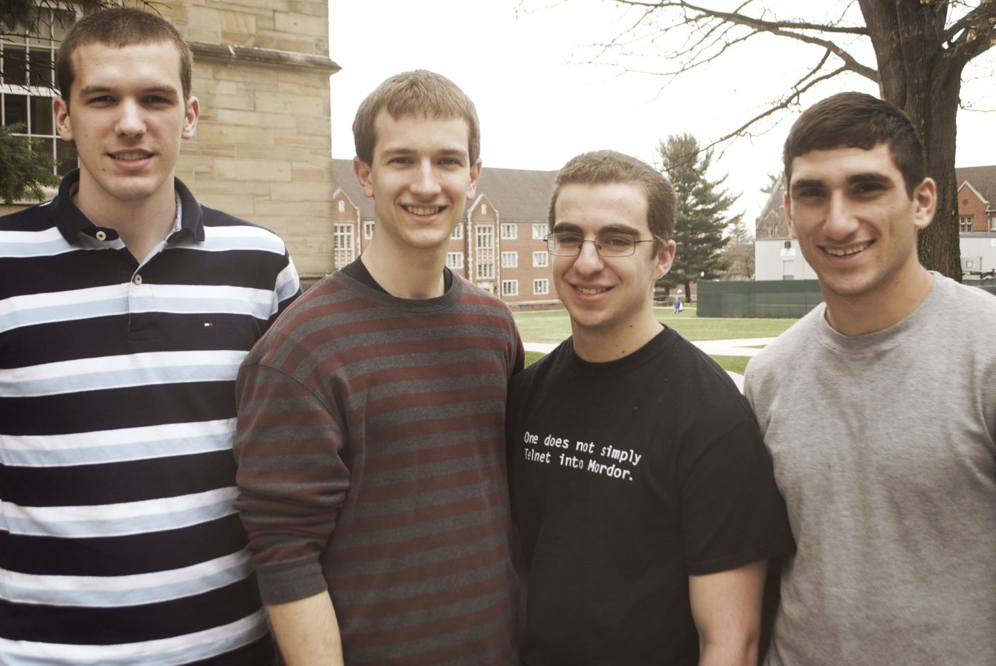 Ian Miller, Andrew Wilson, Orion Correa, and Jake Loosararian stand side-by-side smiling