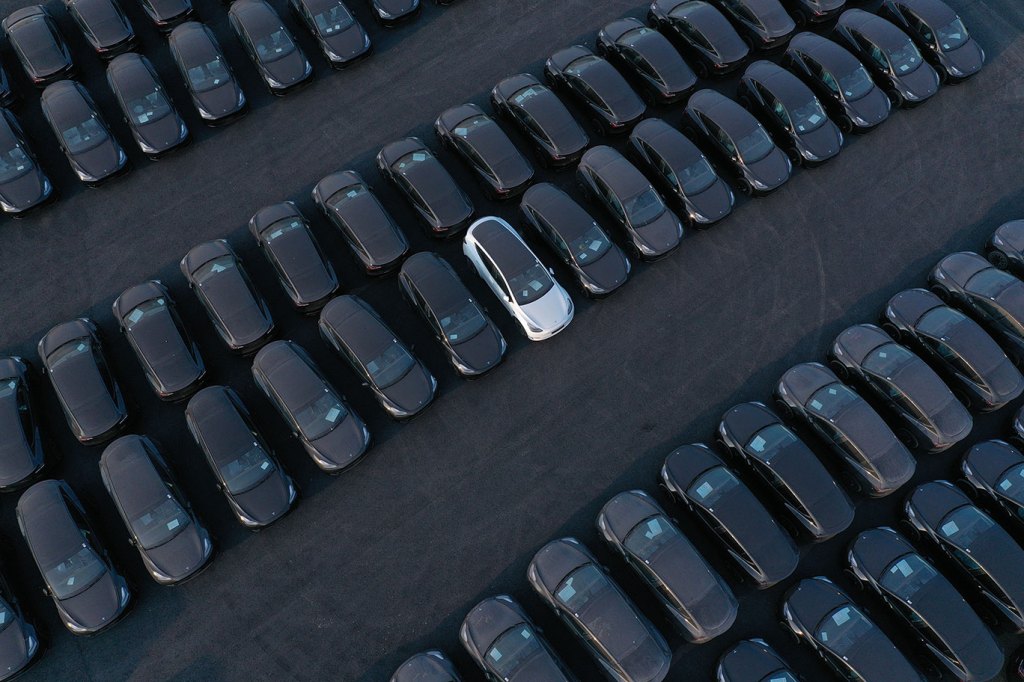 In this aerial view, newly completed Tesla Model Y electric cars stand at the new Tesla Gigafactory electric car manufacturing plant on March 25, 2022 near Gruenheide, Germany.