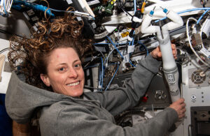 NASA astronaut and Expedition 70 Flight Engineer Loral O’Hara poses with Virtual Incision's spaceMIRA aboard the International Space Station.