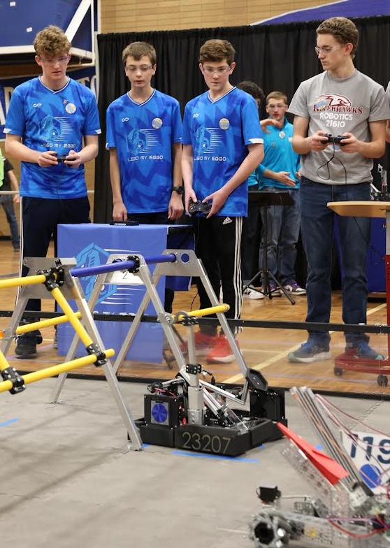 From left: Longtime teammates Ben Wood, Seth Little and Micah Crabb take part in a recent robotics competition. (PHOTO: courtesy Bill Crabb)