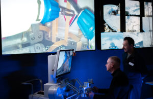 Shane Farritor controls spaceMIRA while his Virtual Incision co-founder Dr. Dmitry Oleynikov watches.