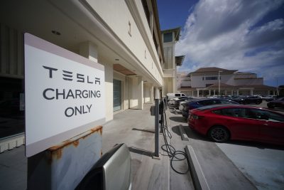 Tesla EV electric vehicle chargers at Ala Moana Shopping Center.