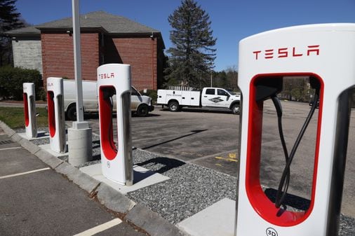 Migrant crisis meets EV charging at a Foxborough motel Migrant crisis meets EV charging at a Foxborough motel