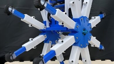 A rimless wheel robot that can reliably overcome steps