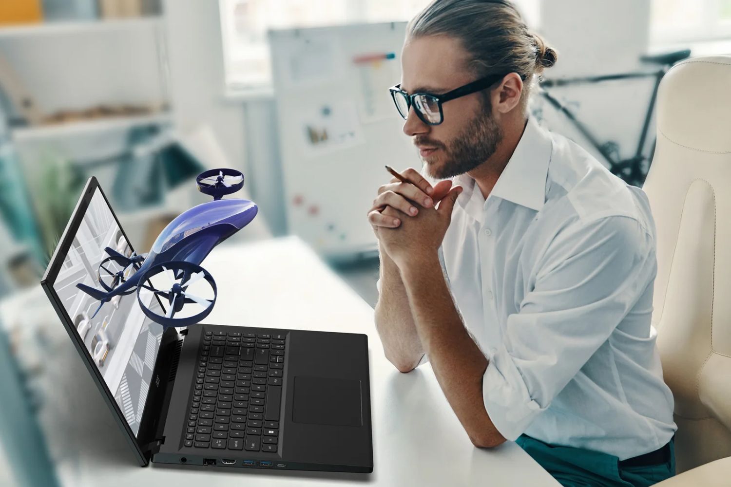 A person looking at an Acer Aspire 3D 15