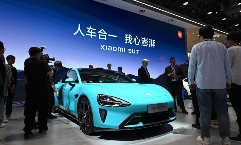 China’s EV execs bullish on Western pressure at Beijing car show China’s EV execs bullish on Western pressure at Beijing car show