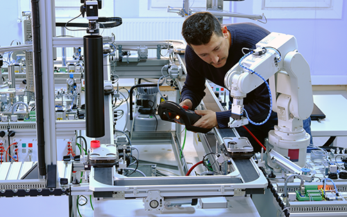Industrial Robots and Their Human Counterparts Industrial Robots and Their Human Counterparts