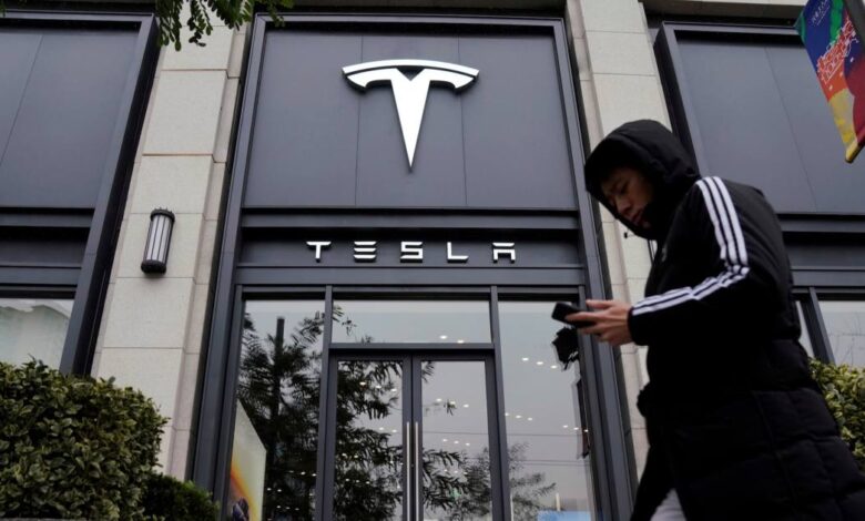 Tesla profit falls nearly 50% as demand and China headwinds persist Tesla profit falls nearly 50% as demand and China headwinds persist