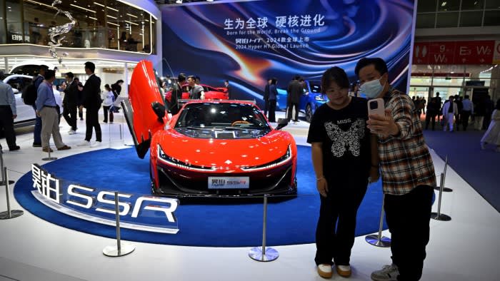 Foreign auto groups embrace local technology in China